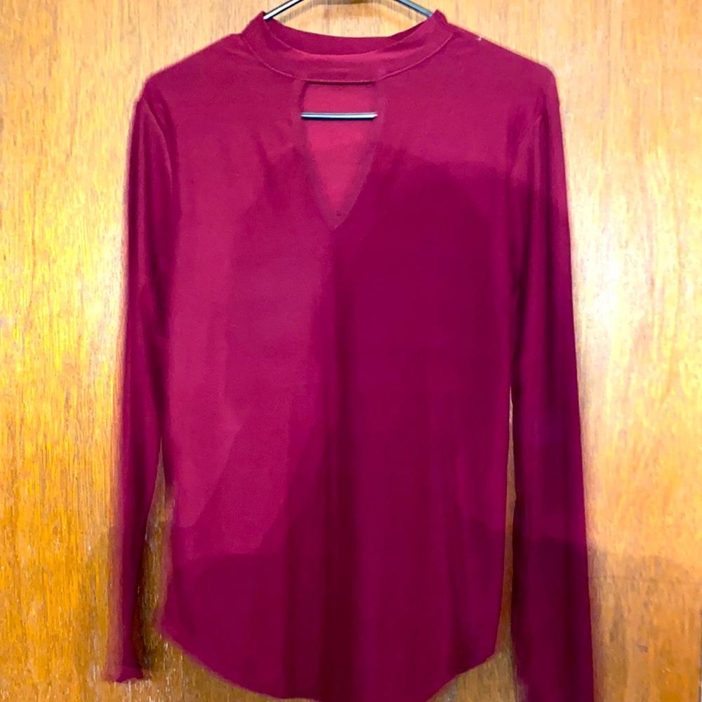 Maroon long sleeve blouse. Never worn.